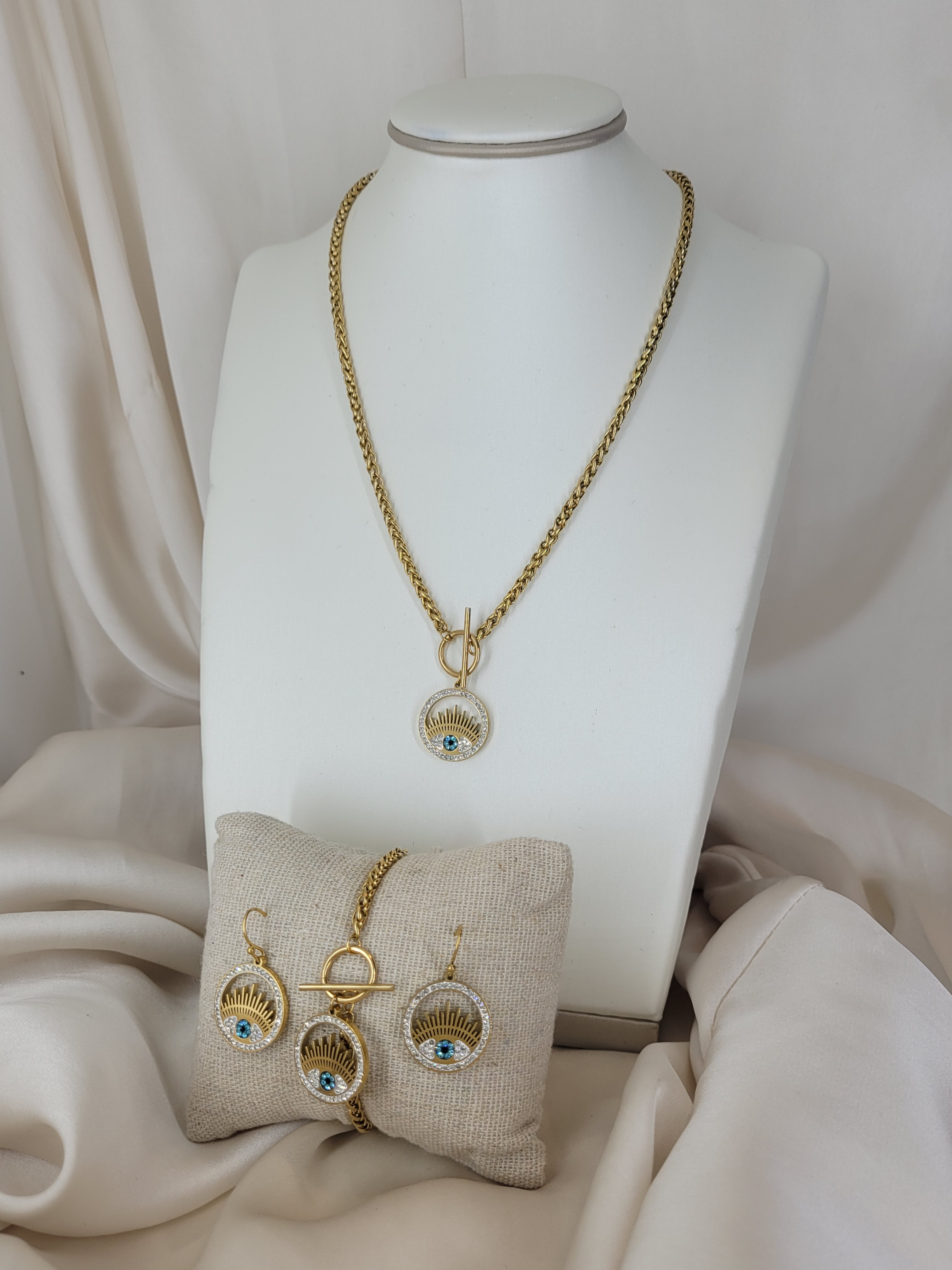 Ensemble œil bleu strass Gourmette