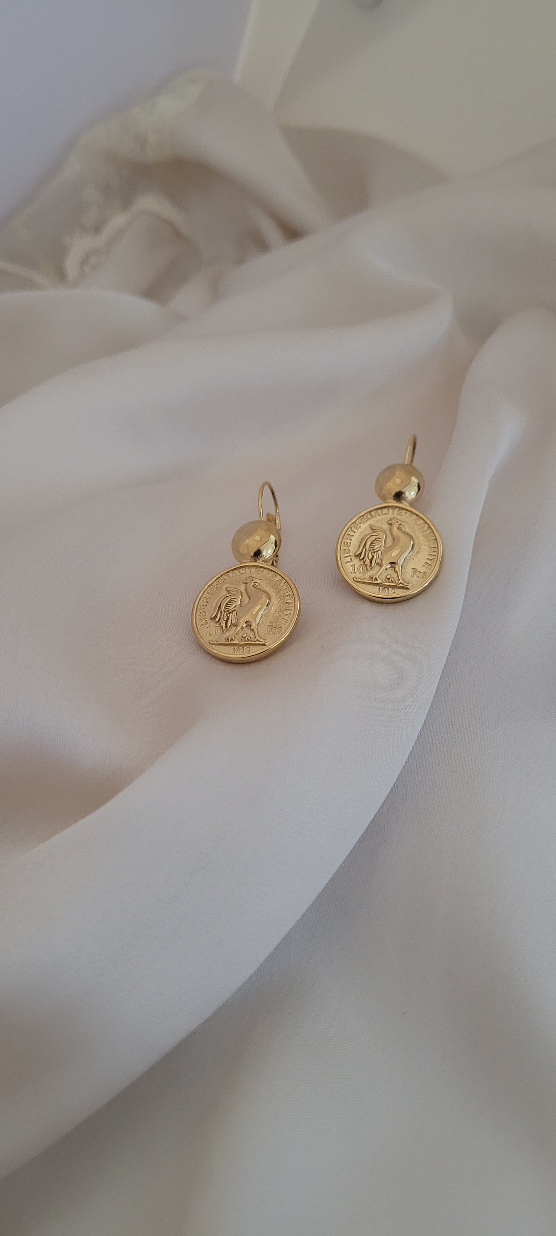 Boucle d'oreille COQ π