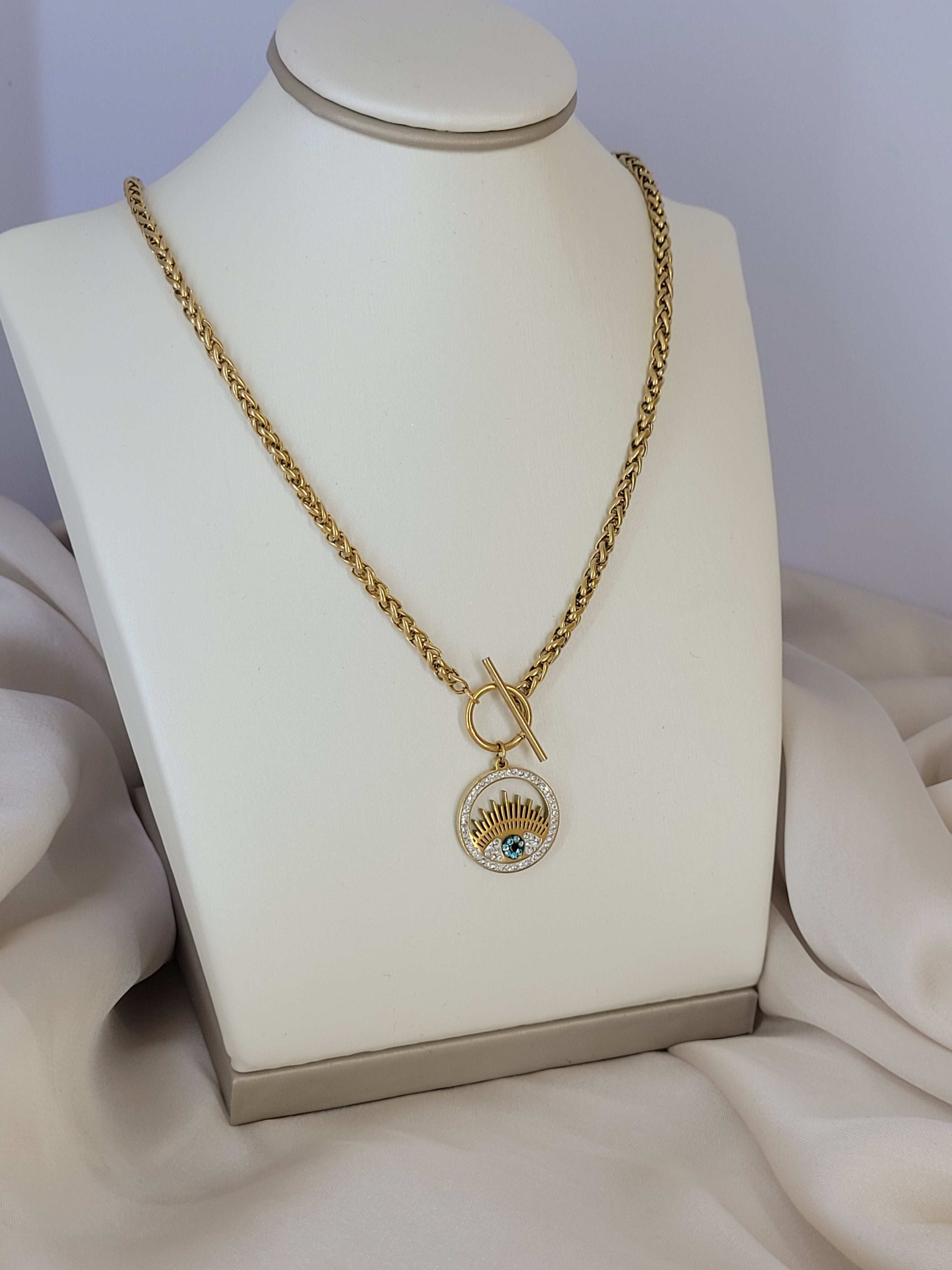 Collier œil strass
